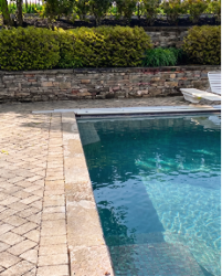 Picture of Hammerhead Pools working on pool equipment