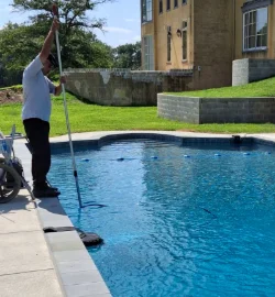 Hammerhead Pools performs routine maintenance on a client's pool in Chester Springs, PA