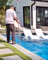 Hammerhead Pools performs routine maintenance on a client's pool in Downingtown, PA