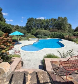 Hammerhead Pools performs routine maintenance on a client's pool in Exton, PA