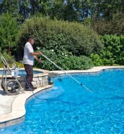 Hammerhead Pools performing routine maintenance on a client's pool in Frazer, PA